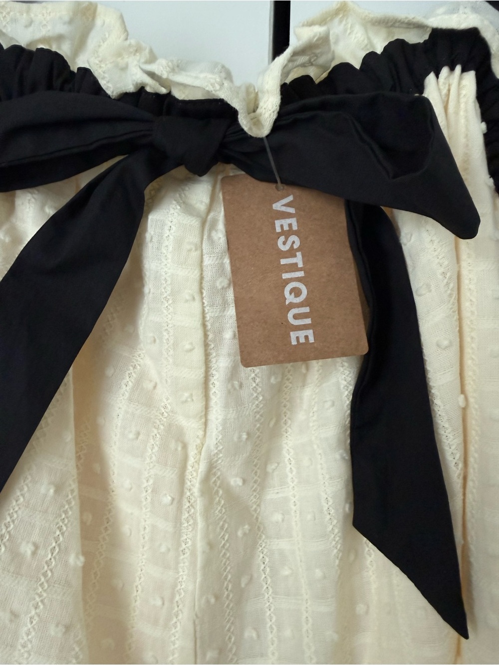 vestique Cream Eyelet Romper with Black Bow Detail - Picture 2 of 4
